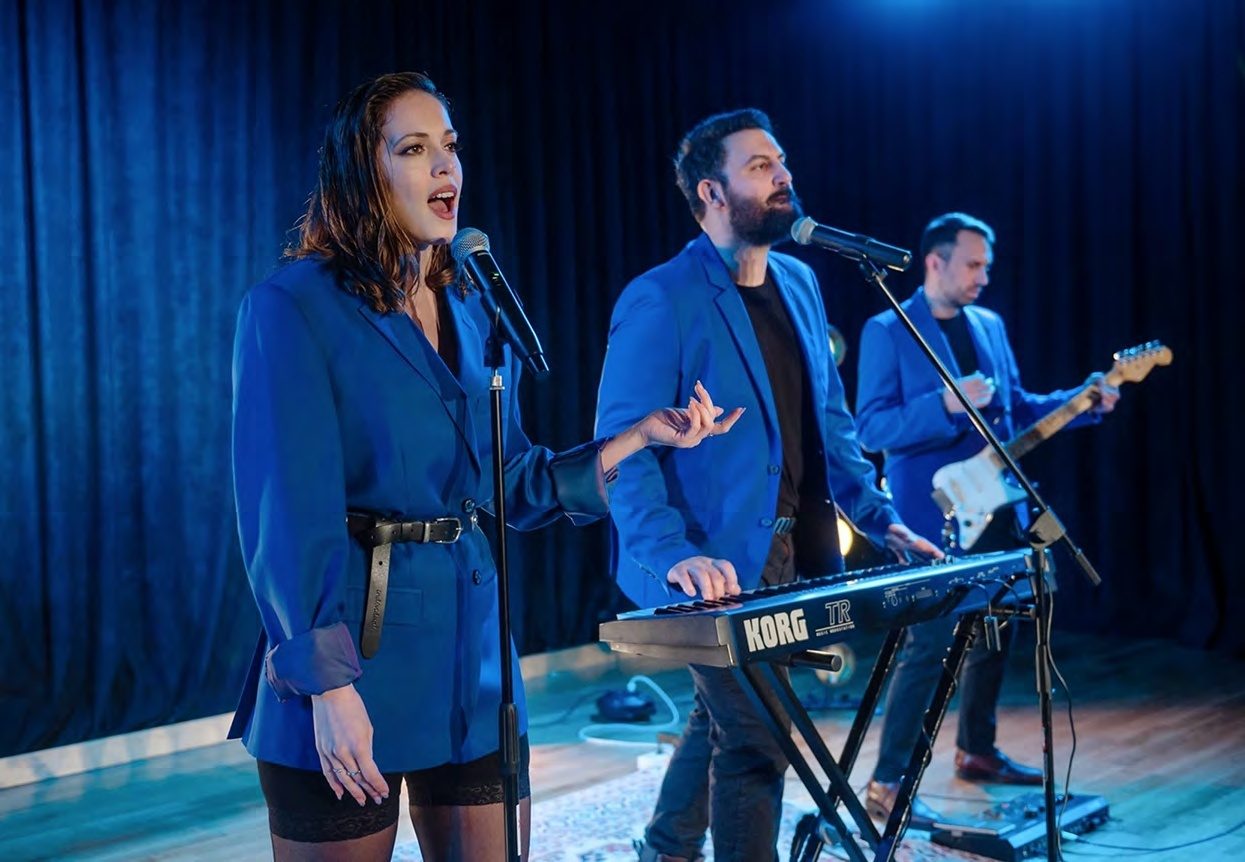KEDA vocalists performing live