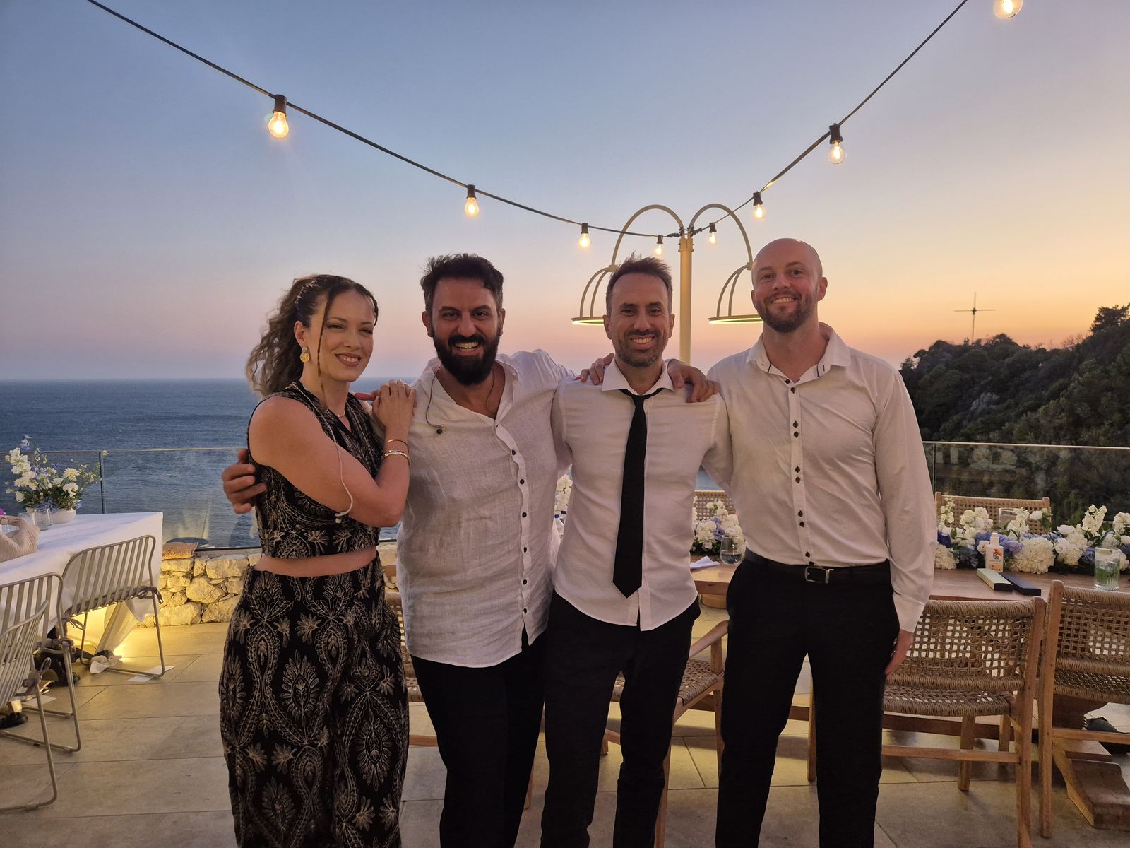 KEDA band at a seaside destination wedding venue at sunset in Greece